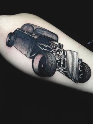 Get revved up with this stunning car tattoo on your forearm, expertly crafted by the talented artist Victor Martin. Show off your love for cars in style!