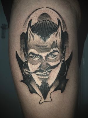 Capture the essence of the night with this striking neo-traditional new school vampire tattoo by Victor Martin on your lower leg.