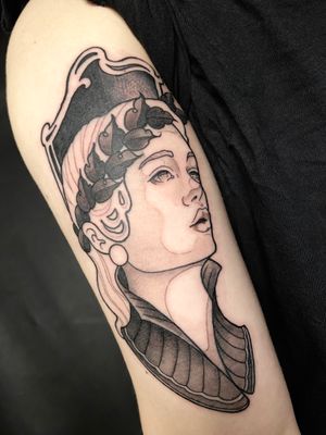 Get a stunning neo traditional lady head tattoo on your upper arm by the talented artist Victor Martin. Perfect blend of classic and modern style.