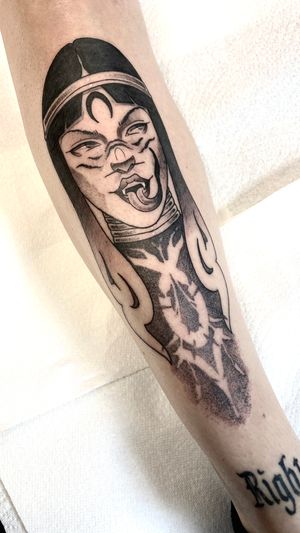 Get inked with a vibrant new school style tattoo of a woman on your forearm by artist Victor Martin.