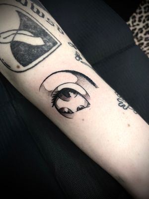 Capture attention with this stunning neo-traditional eye tattoo on your forearm, expertly done by Victor Martin.