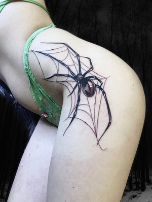 Get tangled in the intricate web of Victor Martin's stunning neo-traditional spider design on your hip. Embrace the dark and mysterious with this unique piece of body art.