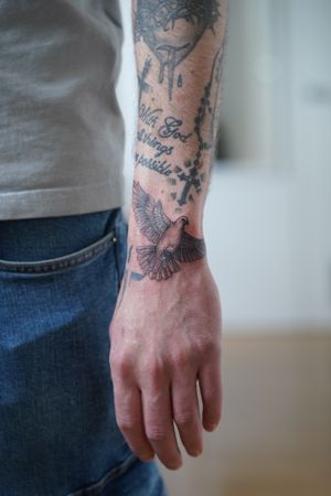 Fine line dove tattoo