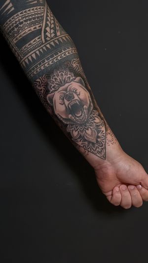 Unique dotwork bear and mandala design with ornamental details, by tattoo artist Luca Salzano. Perfect for forearm placement.