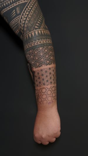 Adorn your arm with a stunning pattern-based sleeve tattoo by talented artist Luca Salzano.