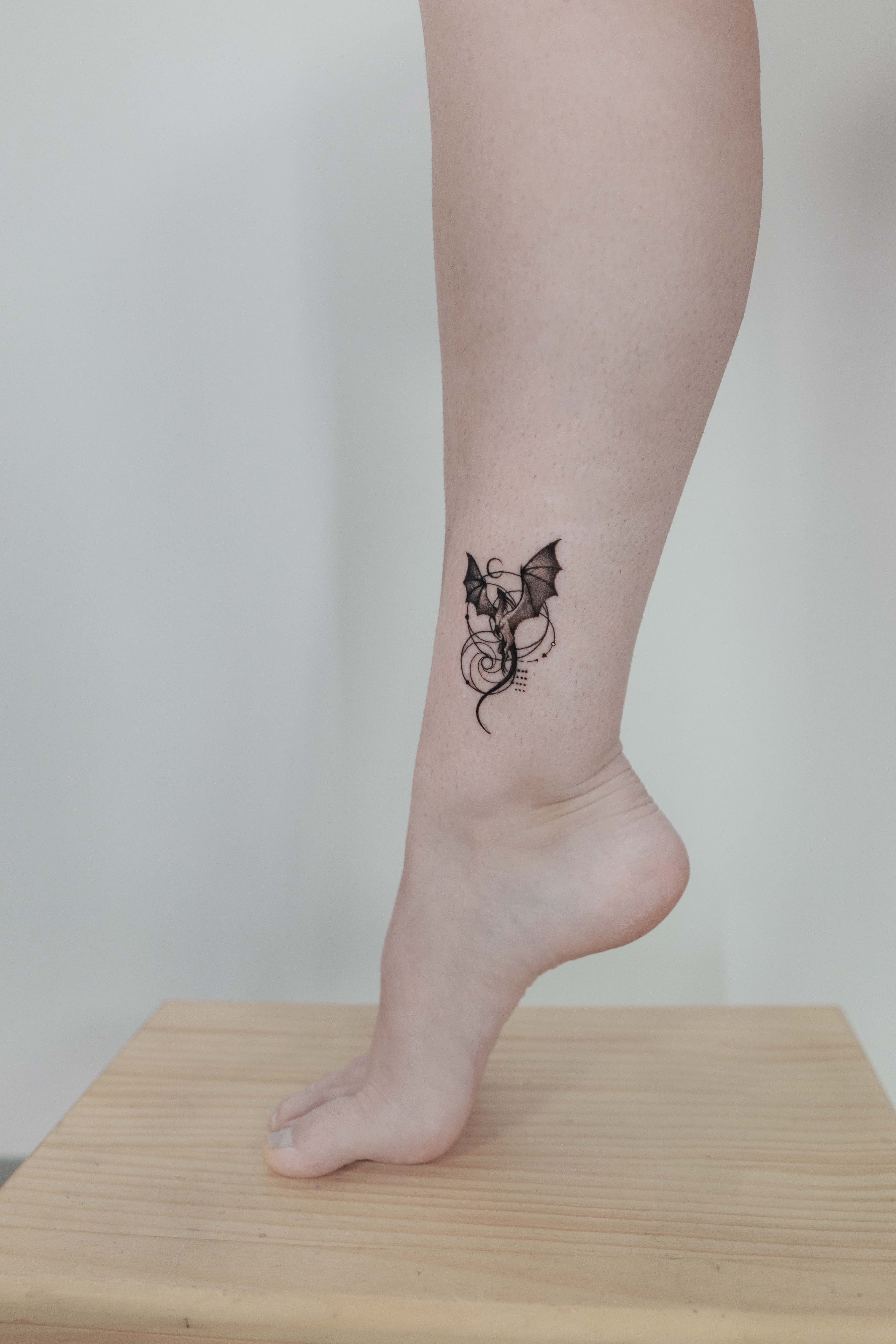 Small Tribal Dragon Tattoo - Temporary Realistic Tattoos | Tattoo Icon –  TattooIcon