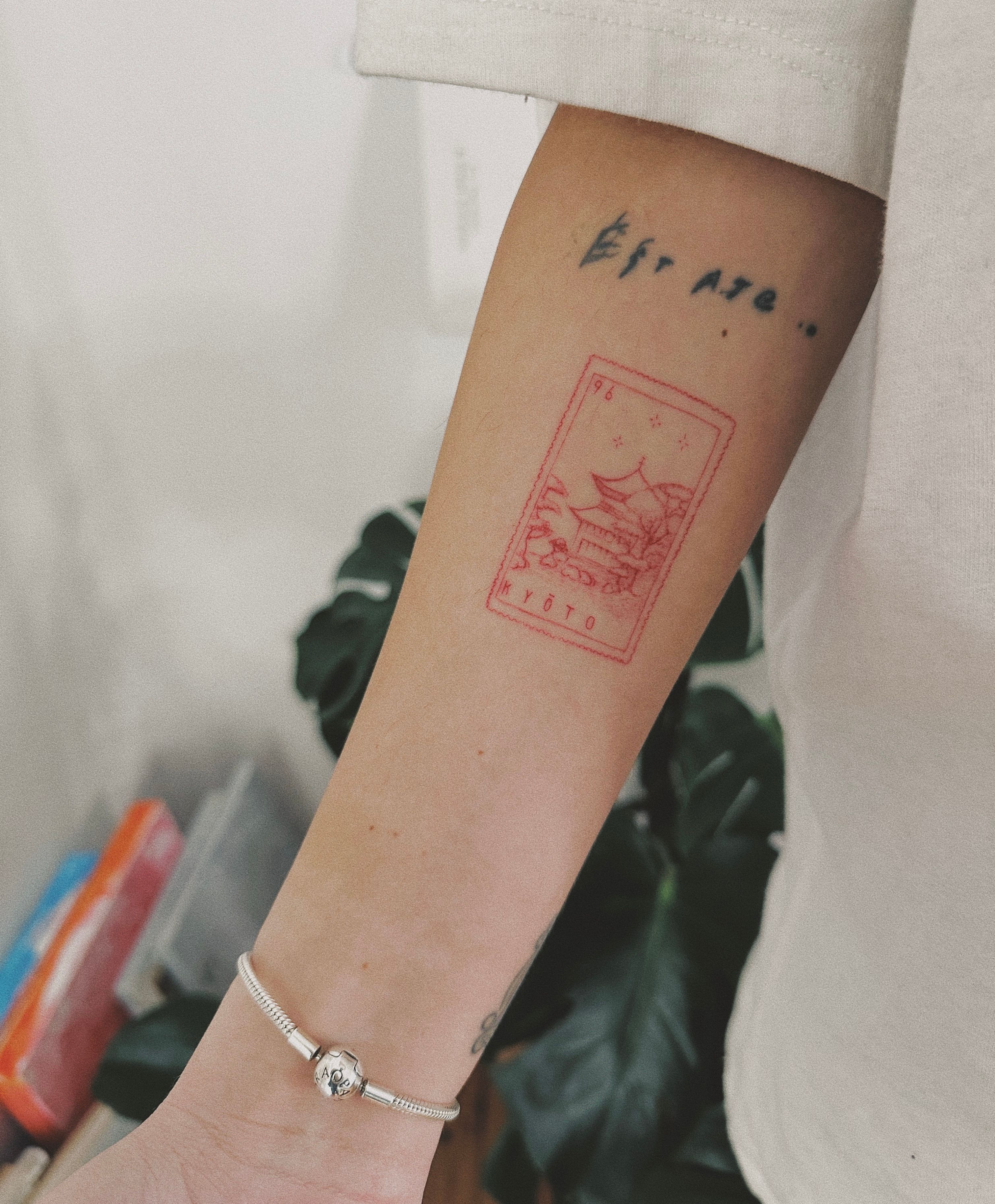 Post Stamp Tattoo with Carnation