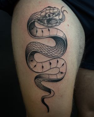 Elegant fine line snake tattoo by Kat Jennings, perfect for a unique and sophisticated look.
