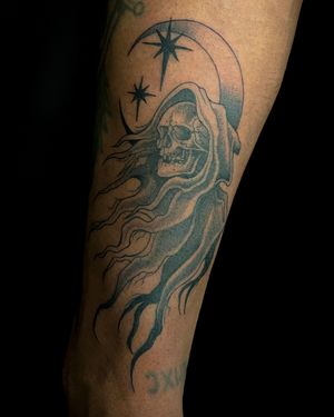 Capture the haunting beauty of death with this stunning illustrative grim reaper tattoo by the talented artist Kat Jennings.