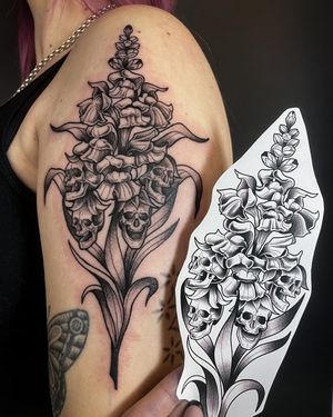 This illustrative tattoo combines a skull with a beautiful skullflower design in intricate dotwork style by artist Kat Jennings.