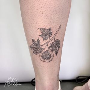 Experience the elegance of fine line art with this intricately detailed fruit branch tattoo by talented artist Chloe Mickham.