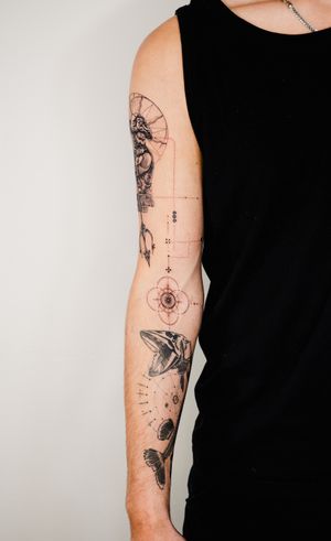 Get a stunning black and gray fine line tattoo with intricate geometric patterns on your arm by Gabriele Edu.