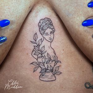 Get a stunning and intricate fine line illustrative statue tattoo by the talented artist Chloe Mickham. Embrace timeless beauty in ink.