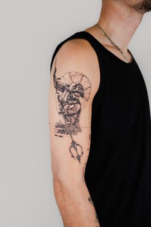 Elegant black and gray fine line geometric tattoo of Poseidon statue by Gabriele Edu, perfect for upper arm placement.