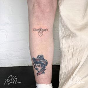 A beautifully detailed tattoo done in fine line style by Chloe Mickham, featuring a heart, chain, and lock motif. Perfect for those who love intricate and illustrative designs.