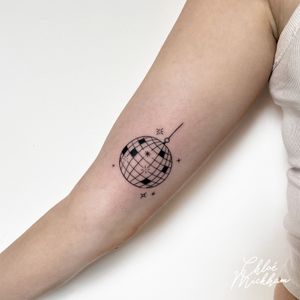 Get groovy with this illustrative fine line tattoo of a disco ball, expertly done by Chloe Mickham.