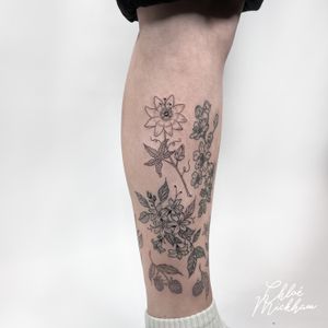 Adorn your skin with a delicate floral masterpiece by Chloe Mickham, showcasing her expertise in fine line tattooing.