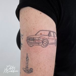 Get a sleek and stylish fine line car tattoo designed by the talented Chloe Mickham. This illustrative piece is perfect for car enthusiasts.