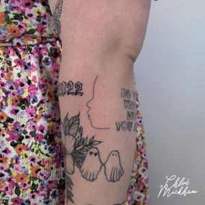 Get inked with Chloe Mickham's delicate fine line tattoo featuring a minimal baby profile design.