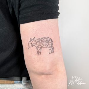 Get a unique tapir design in a delicate fine line style by talented tattoo artist Chloe Mickham.