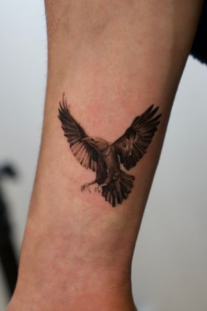 Transform your skin with this stunning black and gray raven tattoo crafted by the talented artist Viola. Embrace the beauty and mystique of these majestic birds.