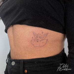 Adorn your body with a stunning fine line angel design, brought to life by the talented Chloe Mickham's illustrative style.