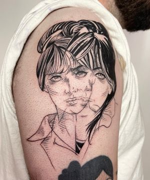 Capture the essence of surrealism with a stunning anime-inspired piece by tattoo artist Ermis Atzemoglou. Featuring intricate details and mesmerizing colors, this tattoo depicts mystical women in a dreamlike world.
