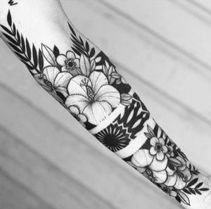 Blackwork floral negative space sleeve
