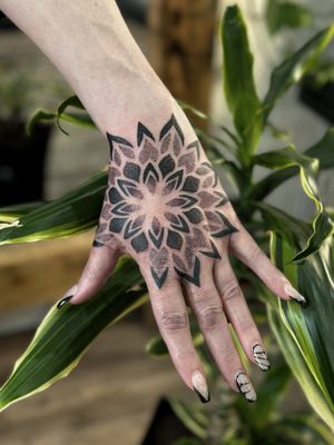 Intricate patterned mandala design created with dotwork technique by talented artist Giada. Perfect for a unique and mesmerizing tattoo.