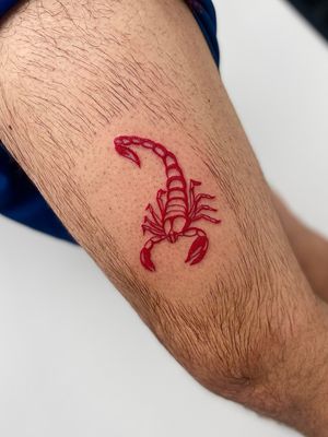 Get a fierce scorpion tattoo in blackwork style on your upper leg by the talented artist Miss Vampira.