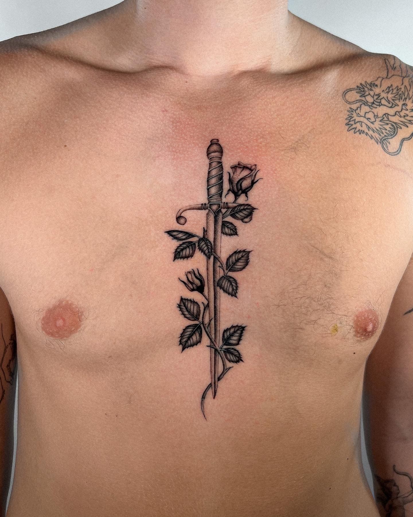 Black Ink Dotwork Flambeau With Sword And Eye Tattoo On Man Chest