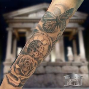Realistic forearm .pocketwatc butterfly rose tattoo