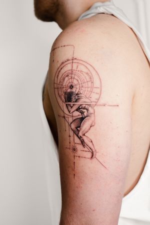 Fine line geometric tattoo on upper arm featuring a man motif by Gabriele Edu, intricate and stylish design.