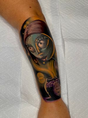 Nightmare before Christmas tattoo made by Pony Stephenson at the Bell Rose Tattoo in Daphne, Alabama.