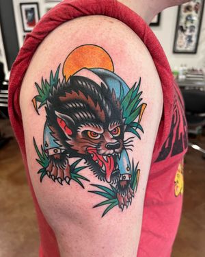 Rougaroux tattoo made by Brent Mccarron at the Bell Rose Tattoo in Daphne, Alabama.
