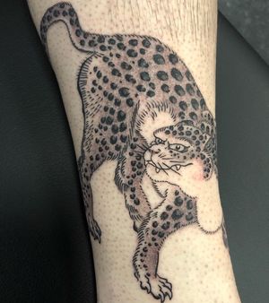 Leopard tattoo made by Robert Johnson of the Bell Rose Tattoo in Daphne, Alabama.