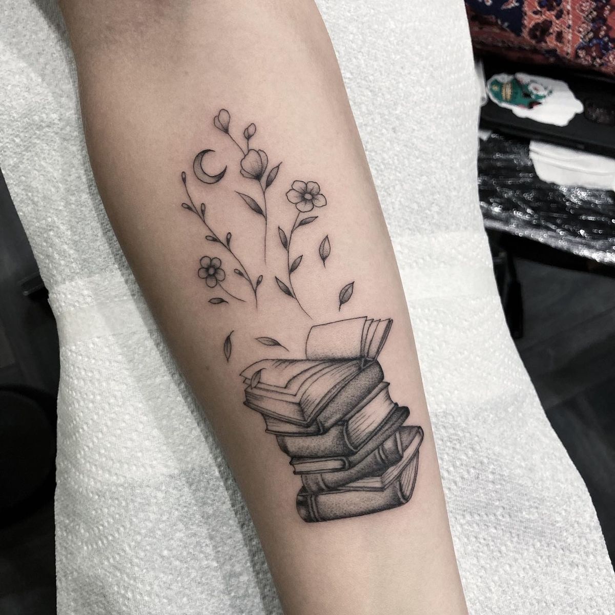 Tattoo uploaded by Luke Smith • Fineline book and floral tattoo • Tattoodo