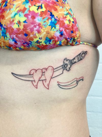 Dagger and hearts with some red ink 