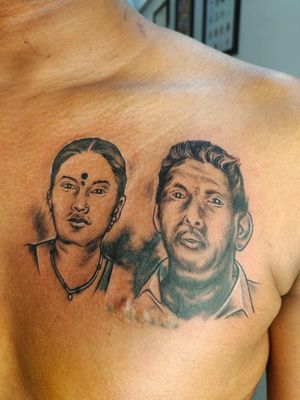 A cover up tattoo of Mom-dad portrait
