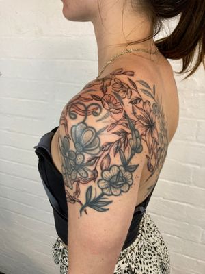 Lily themed botanical tattoo to work with pre existing tattoos 