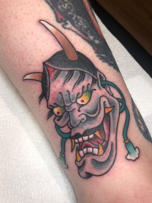 Experience the mystique of Japanese art with this intricate hannya mask tattoo by Carlos Zucato. Perfect for your forearm.