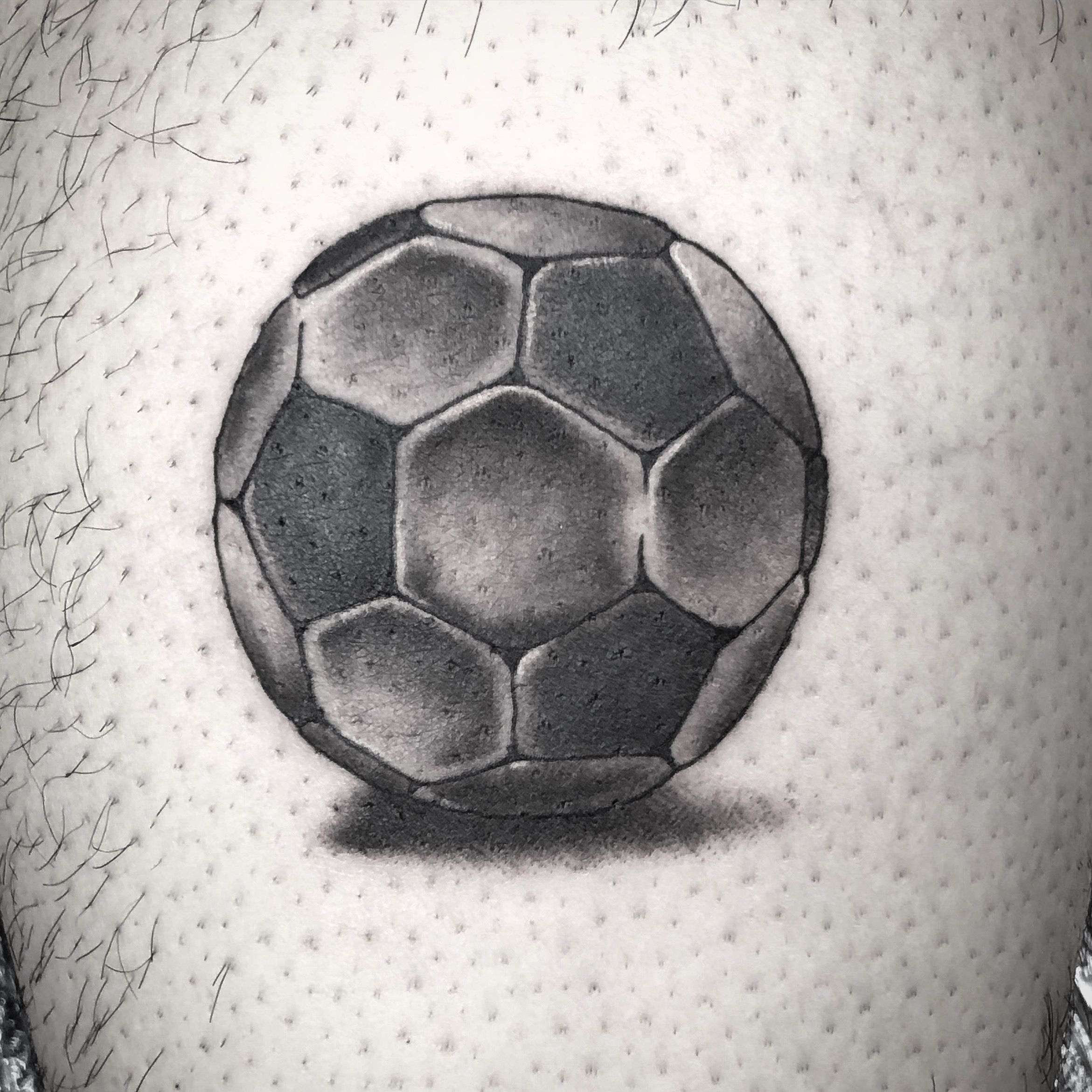 tribal soccer ball tattoo