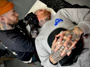 Tattooing by Antony Dickinson 