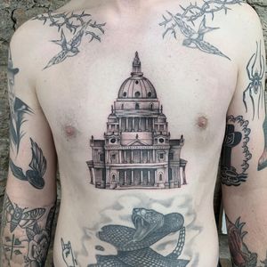 Experience the stunning realism of St. Paul's Cathedral in this black and gray masterpiece by Martin Rosenberg. Perfect for stomach placement.
