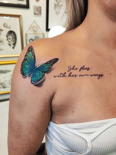 Little color butterfly piece with some script. 