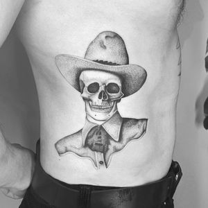Explore the wild west with this fine line black and gray tattoo on your stomach. Artist: Martin Rosenberg.