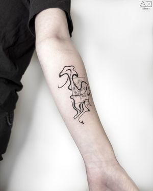 Get mesmerized by Ali Deeran's intricate blackwork design on your forearm, blending surrealism with a unique pattern motif.