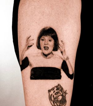 Captivating black and gray upper arm tattoo featuring a stunningly detailed micro-realism portrait of a woman by renowned artist Jay Soze.