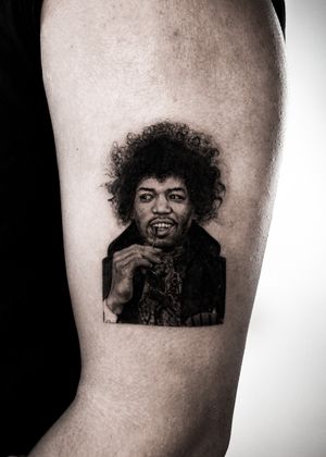 Get a stunning black and gray portrait tattoo of the legendary musician Jimmy Hendrix by artist Jay Soze. Perfect for music lovers!