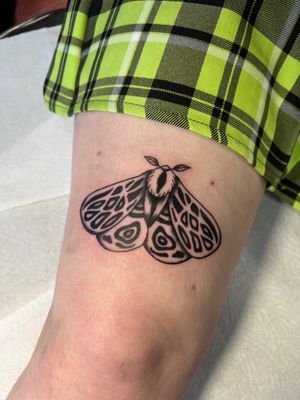 Discover the beauty and mystery of this stunning black and gray moth tattoo by Kayleigh Cole. Perfect for the upper leg placement.